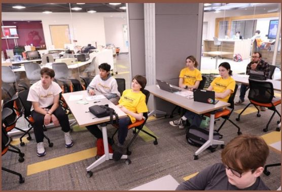 Students working together at HillsHacks