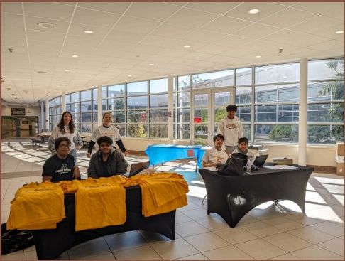 Students coding at HillsHacks